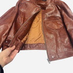 Jolie veste en cuir marron cintrée pour femme avec un cirage élégant